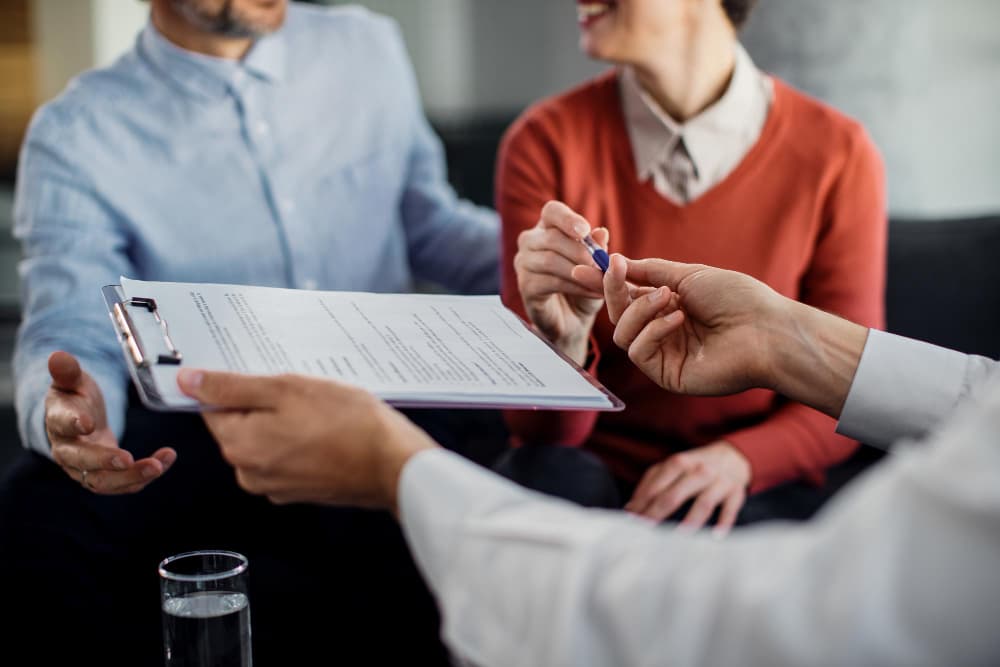 A licensed advisor reviewing coverage options with a couple